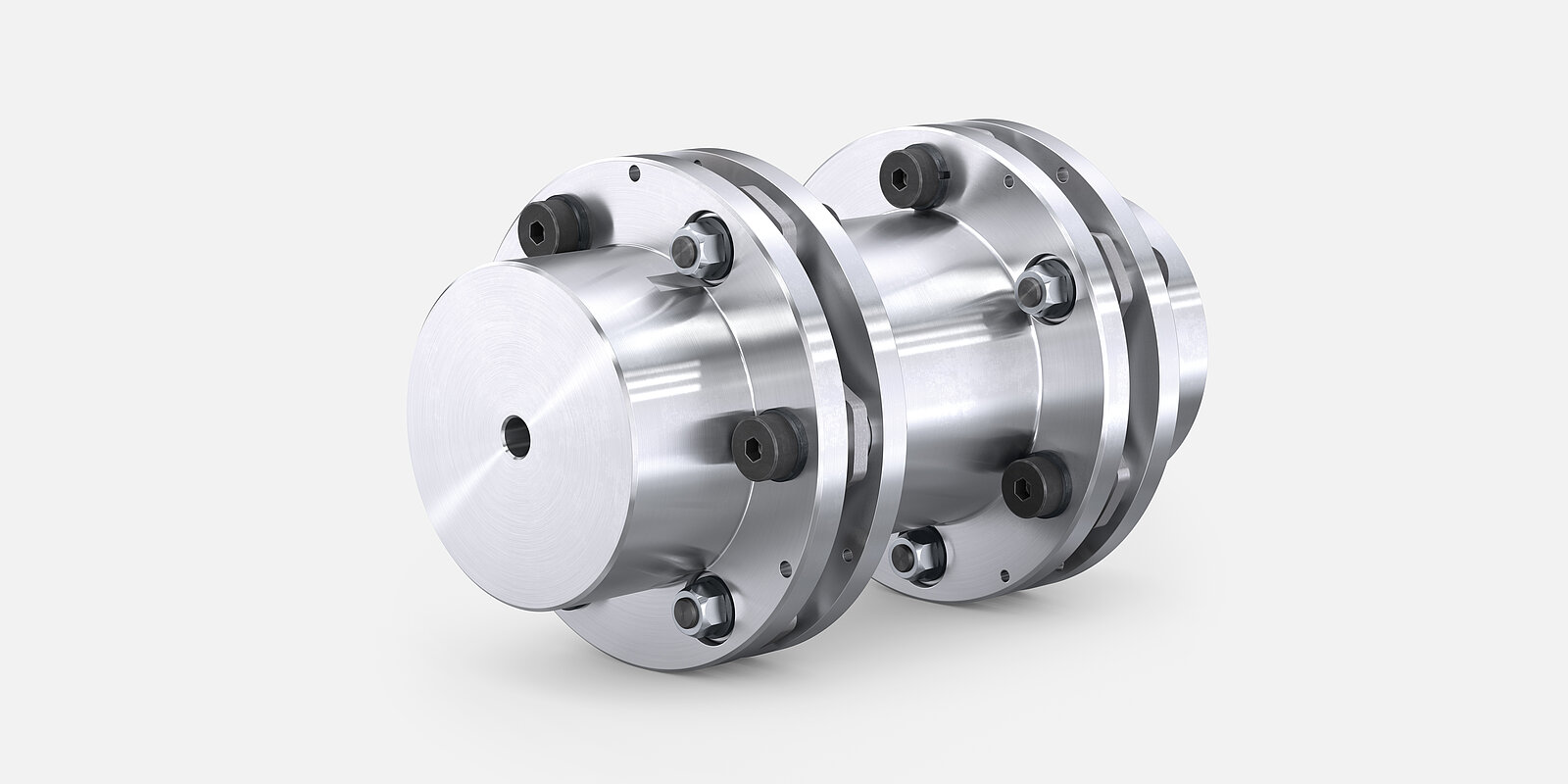 DISCFLEX DNZ-G Metallkupplung, zylindrisch mit zwei Flanschverschraubungen und polierter Oberfläche, auf hellgrauem Grund.